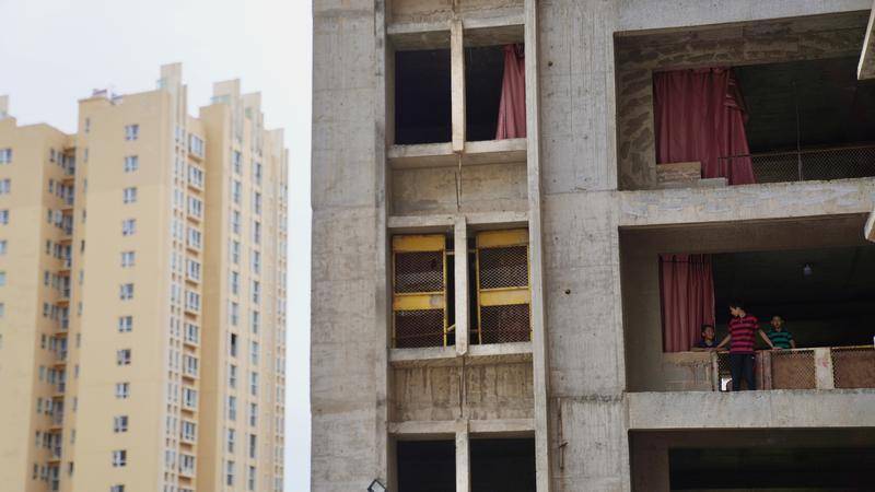商业烂尾楼，德基、宝能们是如何“啃”下来的？